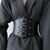 Korset med runde metalspænder – model Avelorn